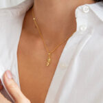 gold feather necklace